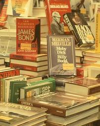 Stacks of Books Displayed on Table