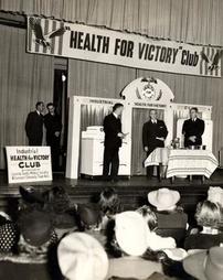 View of stage at first meeting of Health for Victory Club, March 21, 1941