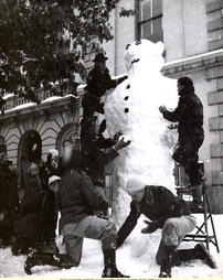 Lamda Chi Pledges Build a Snowman in Front of the Court House