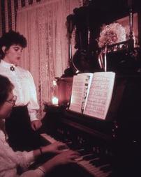 Singing and Playing at Piano