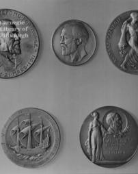 (Five medals-- four Carnegie hero foundation medals (front side), medal of the University of Paris (reverse side))