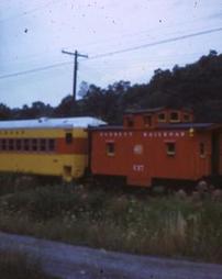 Red Caboose and Yellow Rail Car