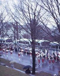 Looking Down at Marching Band in Red and White Uniforms at Maple Festival Parade