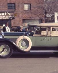 Green LaSalle Phaeton Car in Front of Carl's