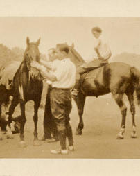 Unidentified people with horses