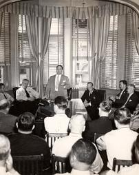 Mayor Leo C. Williamson speaking at meeting of Police Department, 1945
