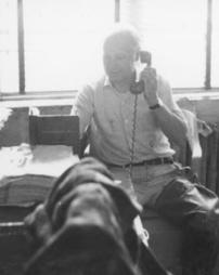 Geological Survey - Geologist Bernard O'Neill in his office after the Hurricane Agnes flood