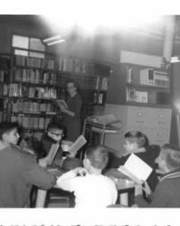 Children and teacher in the Library
