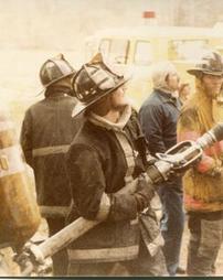 Fire Fighters Using Hose