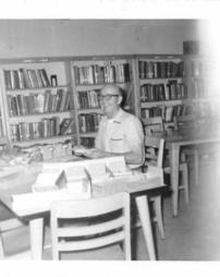 William McCombie in the library