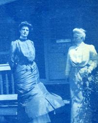 Unidentified women standing on a porch