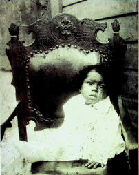 Young child in big chair