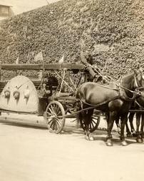 Horse-drawn ladder truck, June, 1917