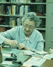 Marguerite Cockley at Library Desk