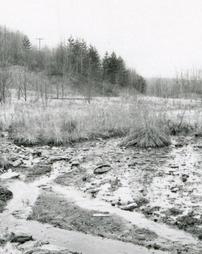 Acid mine drainage from reclaimed strip pit prior to 1965 Backfilling Law