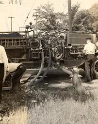 Fire fighters testing equipment, 1939