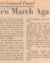 100 firemen march against layoffs