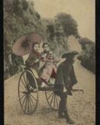 Postcard of women in rickshaw