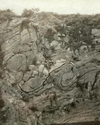 Crumpled strata in limestone quarry