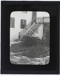 Bermuda Islands. [View of plantings in front of a house]