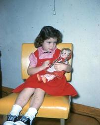 Young girl with doll