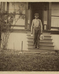 George Zimmerman before painted house, 1920.