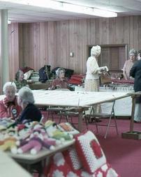 Women in Room with Quilts and Crafts at Maple Festival