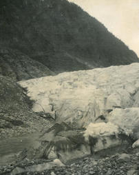 Nose of Mendenhall Glacier showing decaying ice, moraine, and outwash