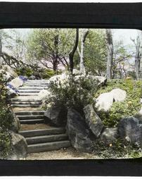 Unidentified. [Wooden Stairs and Rock Garden]