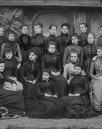 Girls class of 1889 in formal dresses