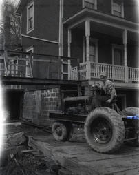 Elmer Schultz on homemade tractor.
