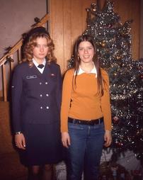 Women in Front of Christmas Tree