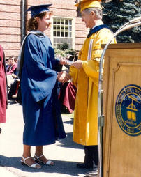 President Blumer Awards Diploma to Meg Altenderfer, Commencement 1986