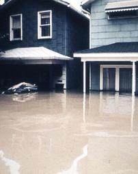 Wilkes-Barre, PA - Boat view of residential area destruction POST Hurricane Agnes flood.