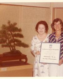 Carmelita Manning (Mayor's Representative) and Dorothy S. Young President American Bonsai Society. 1976 Celebration
