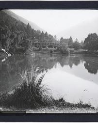 Spain. Unidentified. [View of lake surrounded by trees]