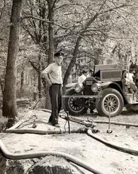 Firemen testing pumper, 1940