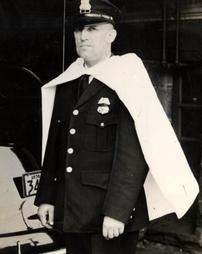 Patrolman Earl Schick ready for duty, 1938