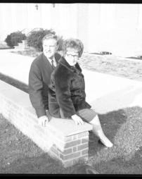 Moving In to new Governor's Mansion - Governor and Mrs. Shafer Sitting on Wall