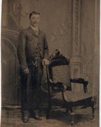 Portrait of Man and Chair