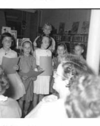 Singing group in the library