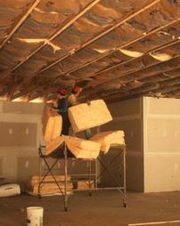 Two Install Insulation to Ceiling
