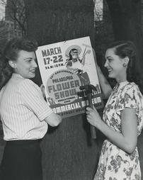 1947 Philadelphia Flower Show. Putting Up Poster Advertising the Flower Show