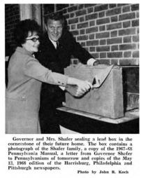 Governor and Mrs. Shafer Sealing a Lead Box