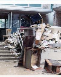 Stark Learning Center furniture debris at Wilkes College after Hurricane Agnes flood.