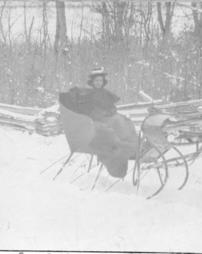 Woman waiting to take a sleigh ride