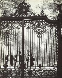 Class of 1965 students at entrance gates