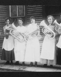 Anonymous group of women with musical instruments