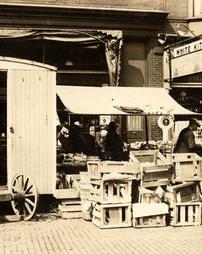 Curbstone market in front of White Kitchen Restaurant, circa 1920