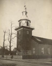 Church Steeple with man working on top